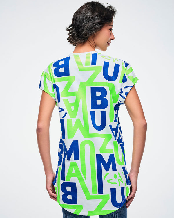 Back view of a female model wearing a colorful t-shirt with