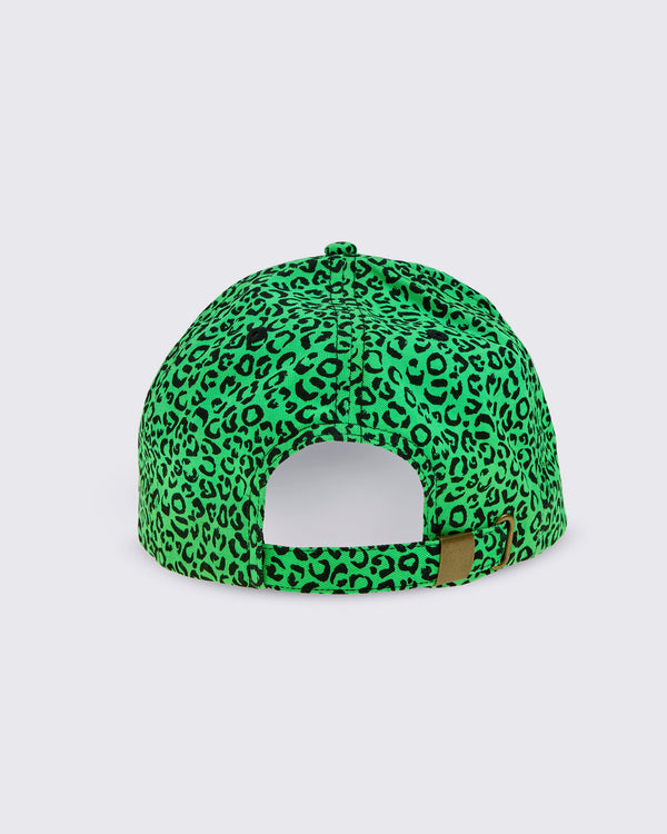 A green baseball cap with a black leopard print pattern, shown from the back and showing the adjustable metal and strap closure.