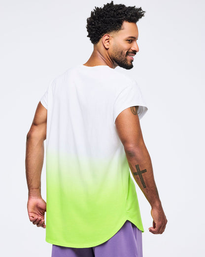 Back view of man wearing a pastel ombré T-shirt that fades from green at the bottom to white at the top, on a white background.