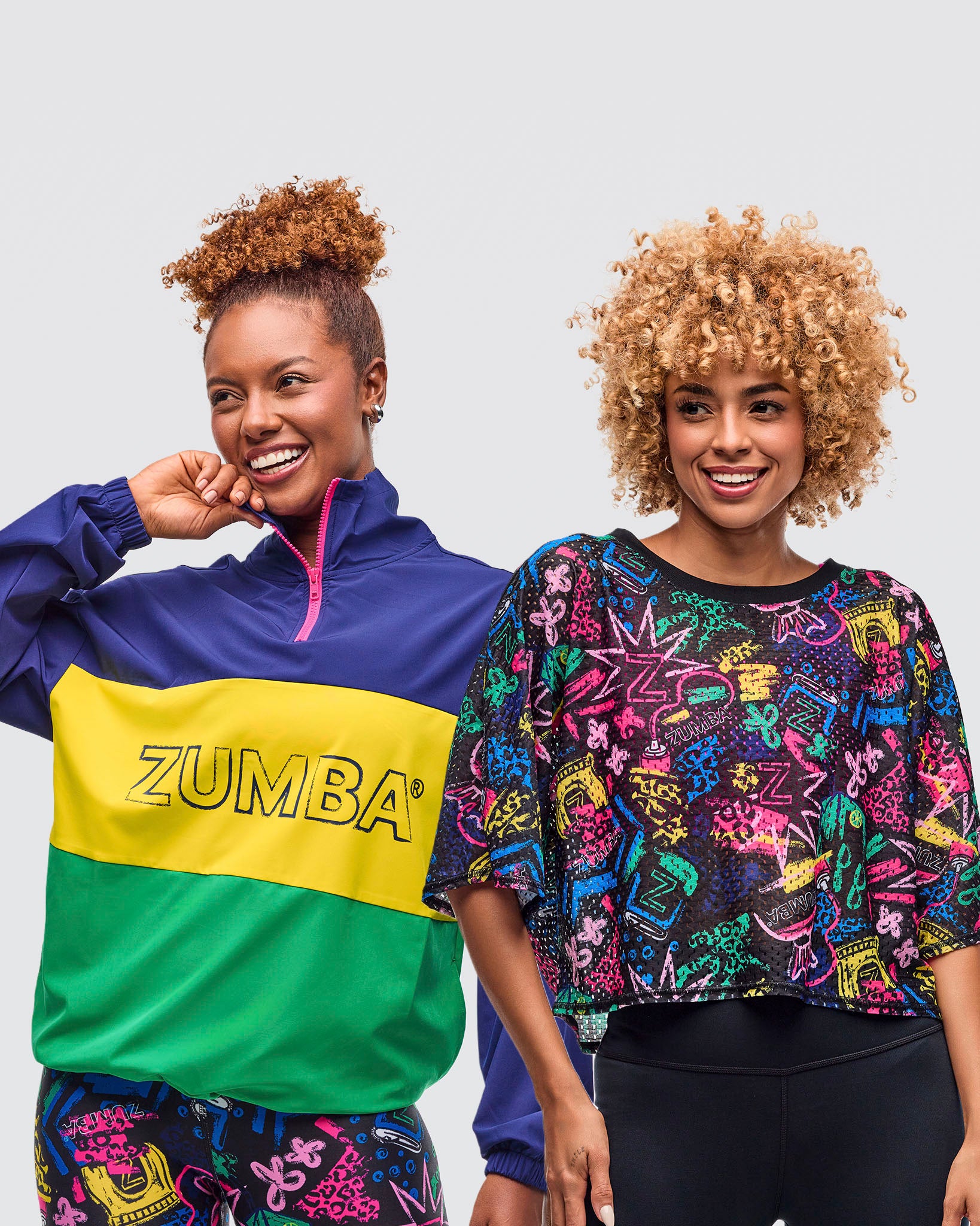 A bundle image of two female models wearing colorful Zumba clothing against a plain background.