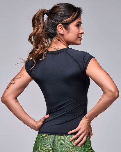 Back view of the black 'STRONG iD' muscle top, showing the raglan sleeve seams and a close, fitted shape.