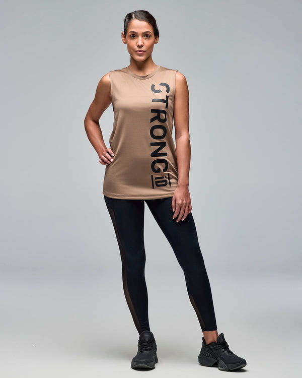 Taupe sleeveless athletic tank with a crew neckline and oversized vertical black 