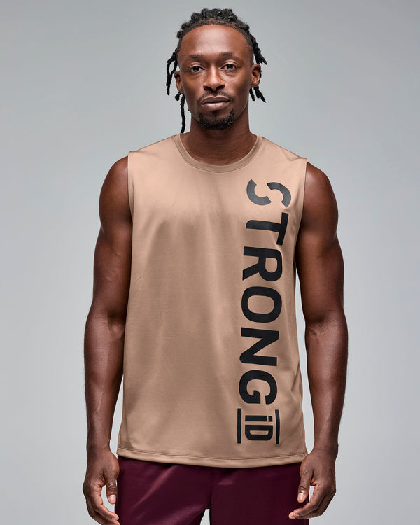 Taupe sleeveless athletic tank with a crew neckline and oversized vertical black 