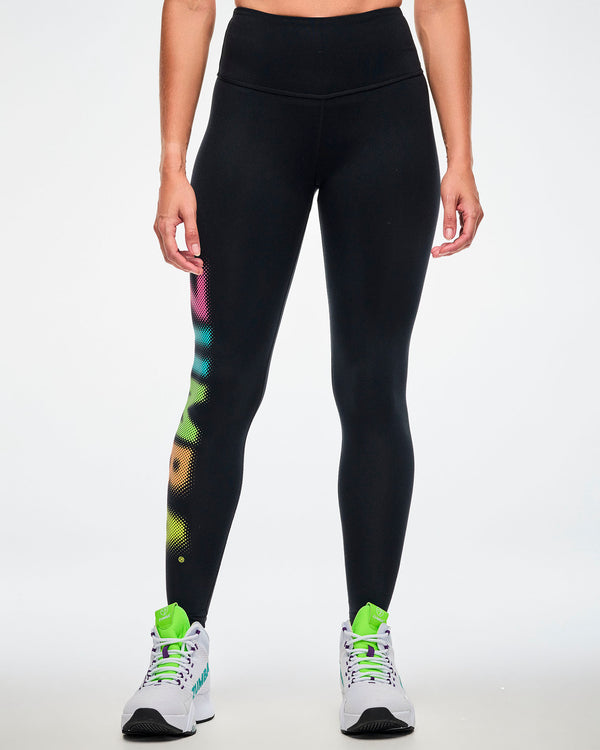 Female model, front view, wearing black high-waisted ankle leggings with a partial view of the dot-gradient 