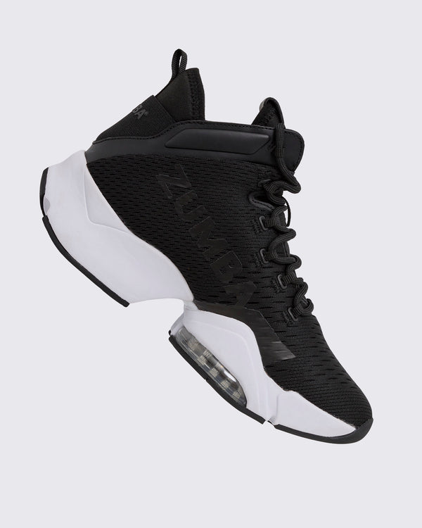 Black Zumba high-top athletic sneaker shown from the opposite side, with textured mesh, black laces, oversized tonal logo, and sculpted white sole with clear air cushioning.