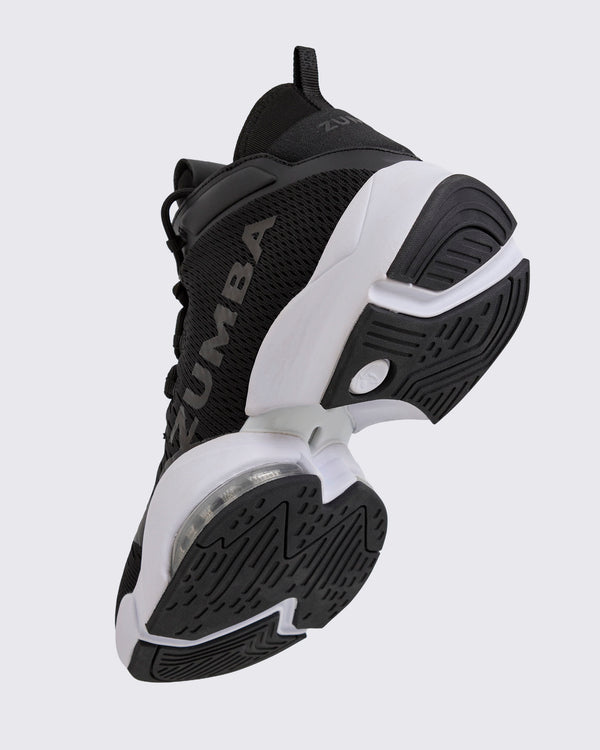 Black Zumba high-top athletic sneaker shown from the bottom angle, emphasizing the textured outsole, split sole design, and visible air unit under the mid foot.