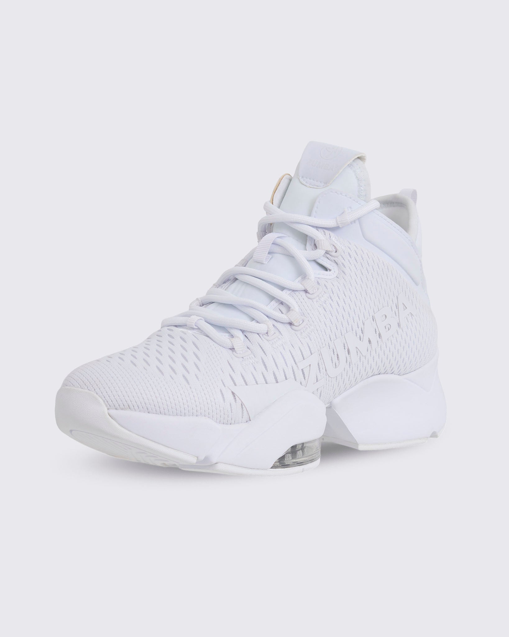 White Zumba high-top athletic sneaker in a front side view, with a breathable mesh upper, lace-up closure, oversized Zumba logo, and thick sole with a visible air cushion.