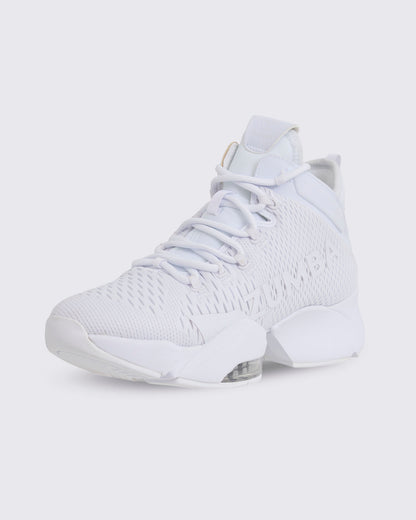 White Zumba high-top athletic sneaker in a front side view, with a breathable mesh upper, lace-up closure, oversized Zumba logo, and thick sole with a visible air cushion.