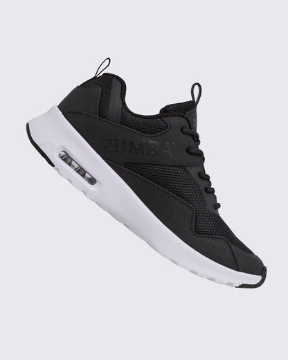 Black Zumba low-top athletic sneaker shown from the opposite side, with textured mesh panels, black laces, embossed side logo, and a thick white sole with a visible air unit.