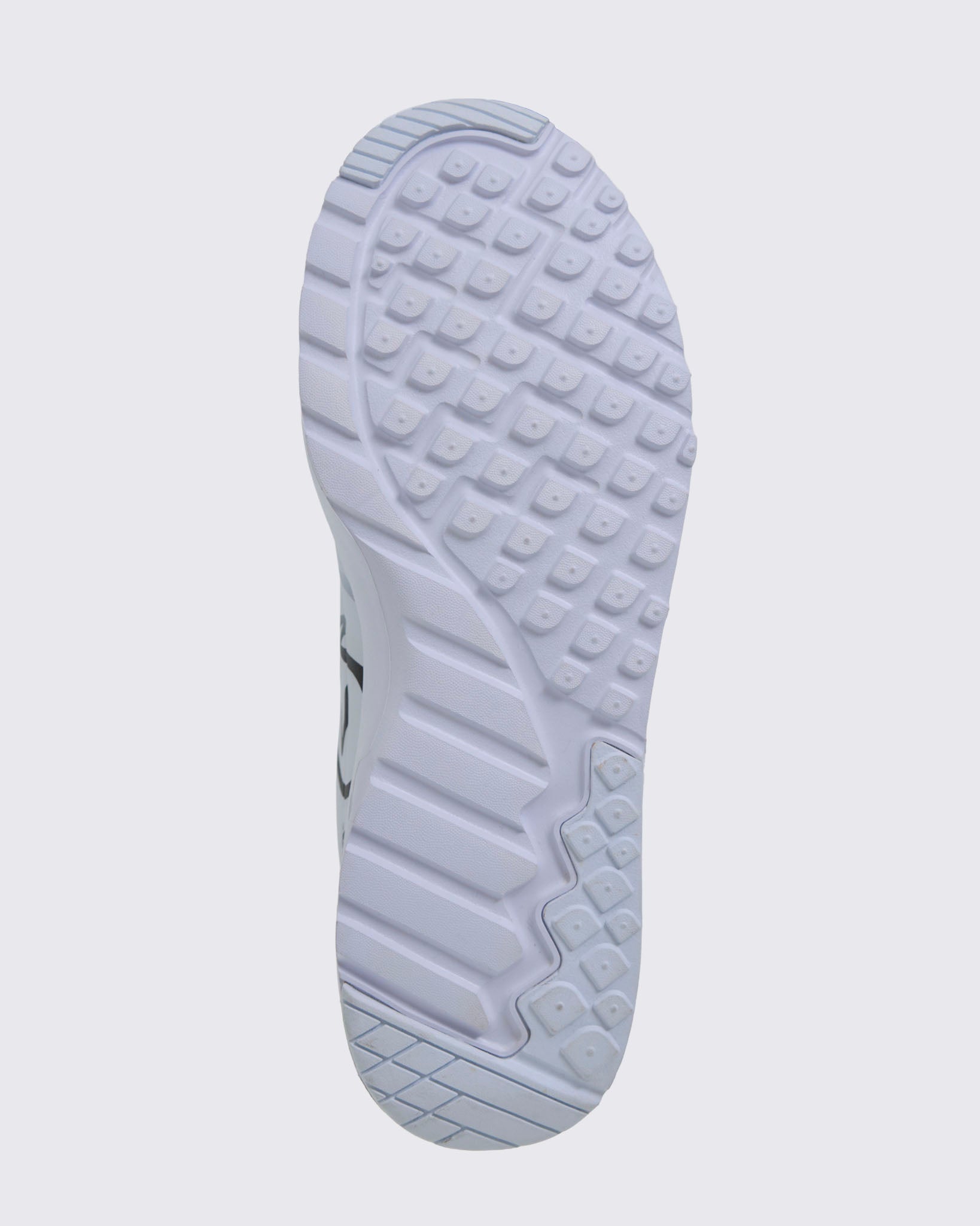 Close-up of a white shoe sole with tread pattern on a light gray background