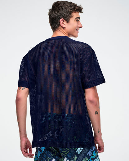 Back view of a male model wearing an indigo Zumba mesh top against a white background.