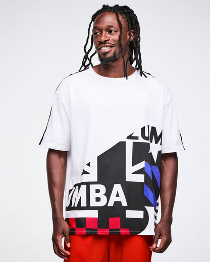 Male model wearing a white t-shirt with a colorful graphic design on a plain background.
