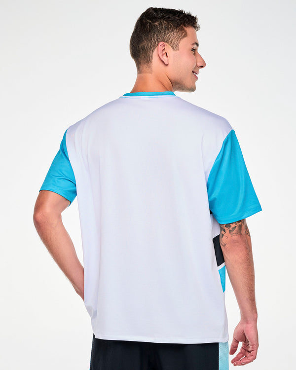 Back view of a male model in the blue and white Smurfs mesh top, showing a plain white back with blue sleeves and a blue crew neck.