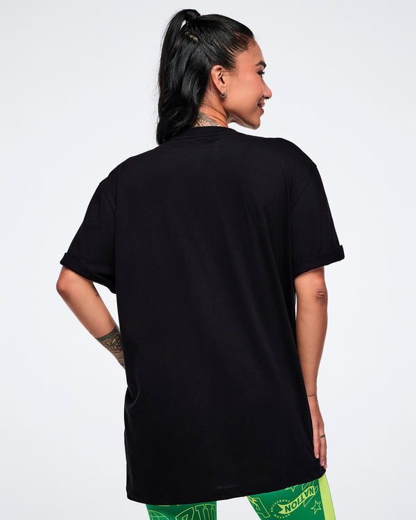 Female model showing the back view of   a black t-shirt on a white background.