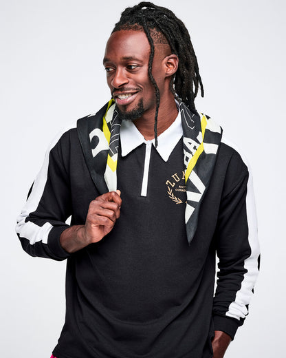 Male model wearing a black and white polo shirt with a bandana.