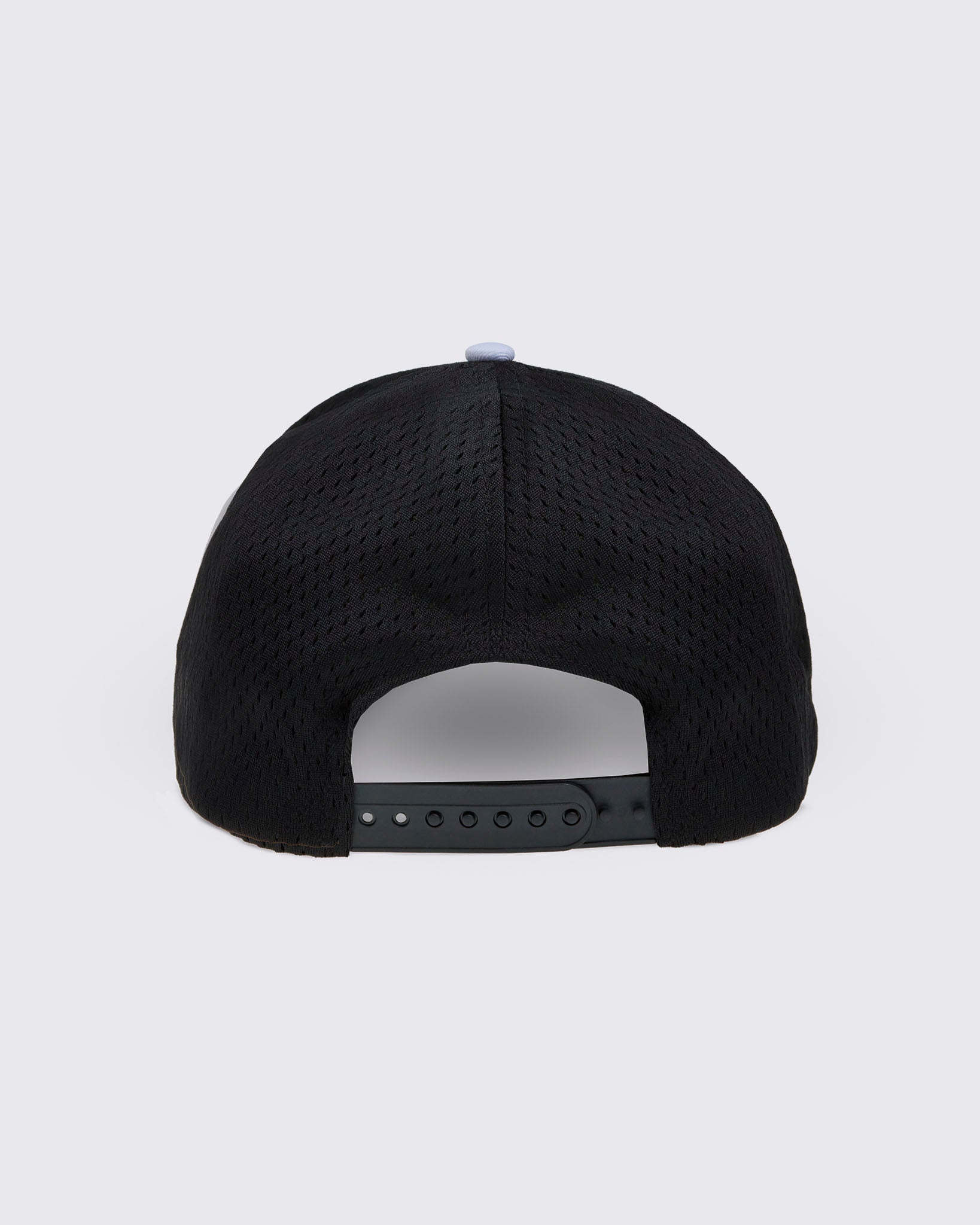 Back view of the Zumba cap highlighting the black mesh, white top button, and snapback closure.