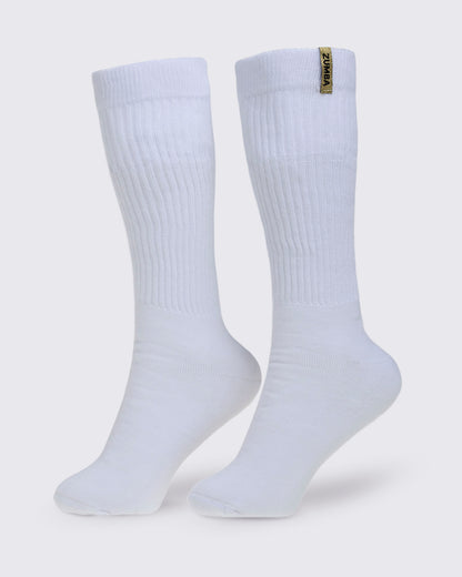 Pair of white socks with a gold Zumba logo on a white background.
