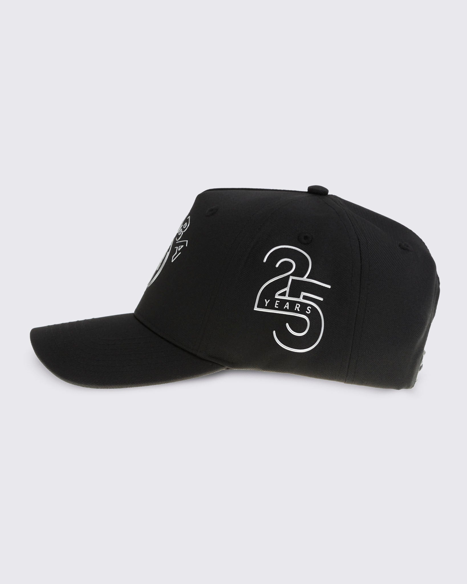 Black baseball cap with curved brim and silver 25 Years graphic on the side, shown in side view against a light gray background.