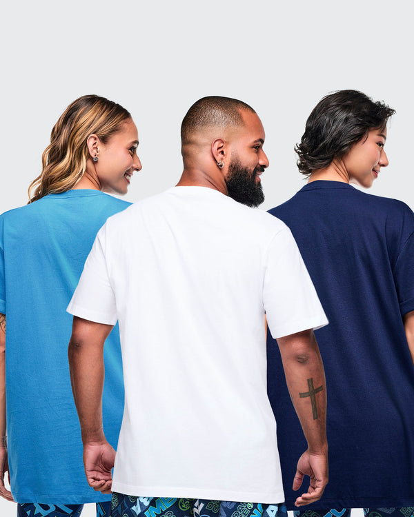 Back view of three models wearing light blue, white, and dark blue Zumba T-shirts from a 12-pack.