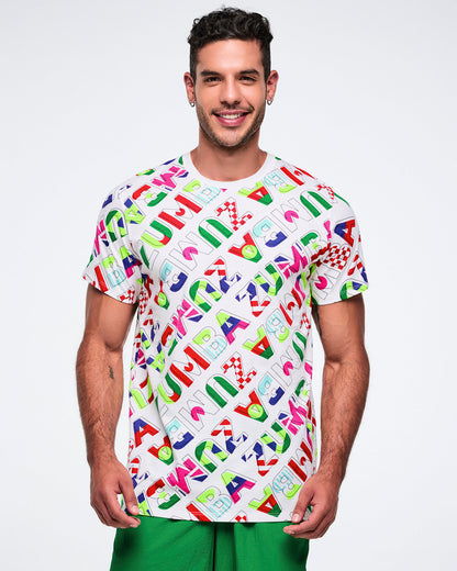 Male model wearing a colorful patterned t-shirt on a white background.